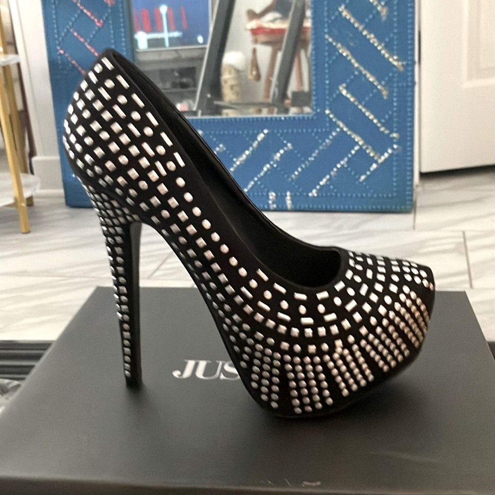 Never worn only tried them on sky high silver accented 3” platforms.